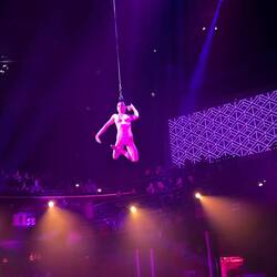 Hanging from her HAIR