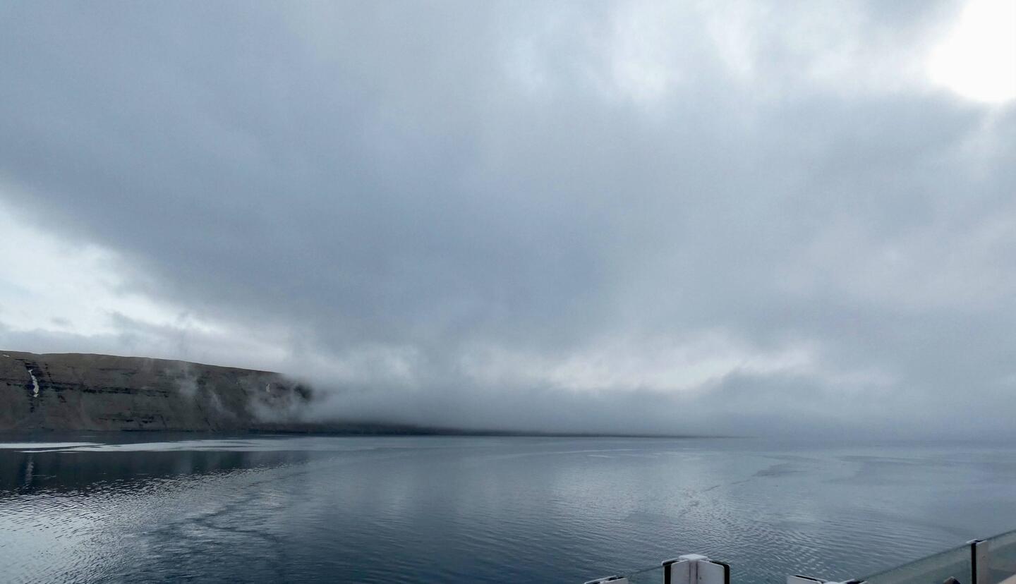 Fog cloud over the water. Maxwell Bay.