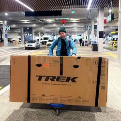 Bike box on trolley always a pain when negotiating airport bollards and the roped off queuing lanes