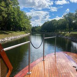 Wooden boat canal cruise