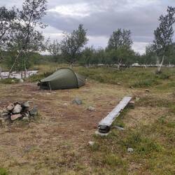 Camping near a small stream. Saana in the background.