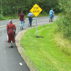 Mennonites on scooter bikes