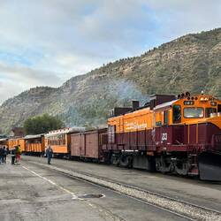 A diesel-hauled train is about to precede ours. This service suits some visitors.
