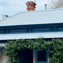 Tin rooves and brick chimneys