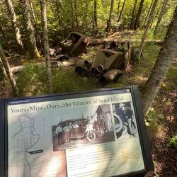 Some old cars left behind. Zoom in to read the sign for info.