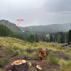 Crossing the head of the valley as the weather gets showery