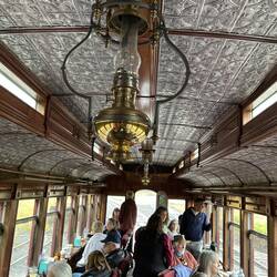 Beautiful pressed-steel ceiling and (electric) retro lighting fixtures