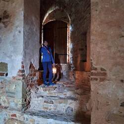 Walking with a lantern in the west Tower.