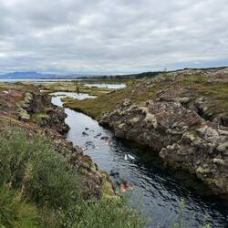 Snorkelers heading off down the fissure