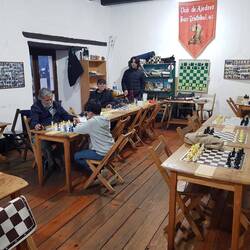 I stumbled upon the town's chess club. I beat the two gentlemen in the background quite easily.