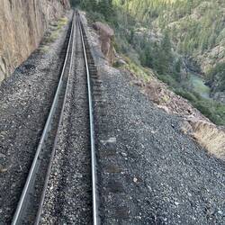 A check rail is provided to (hopefully) stop a derailed car from 'going over' 😧