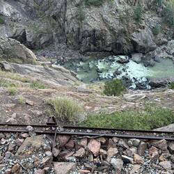 400 ft above. With binoculars, you should be able to see the fish.