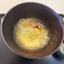 My sea bream ramen at the Sakura First Class Lounge.