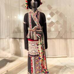 Costume 2001. Cotton, Metal Coins, Wool; Woven Patterns with Extra Weft, Applique, Embroidery
