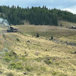3 steam engines. Our train (left), the southbound is approaching, and a light engine is on the loop.