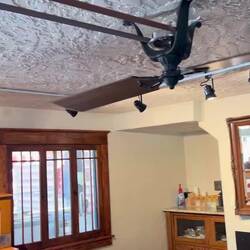 Original ceiling fan arrangement in the Iron Rails Hotel lobby/restaurant/bar area