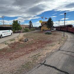 ... past our waiting road coach, and into the station