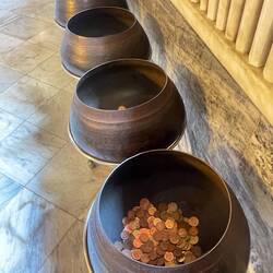 Used for prayer? A coin dropped in each