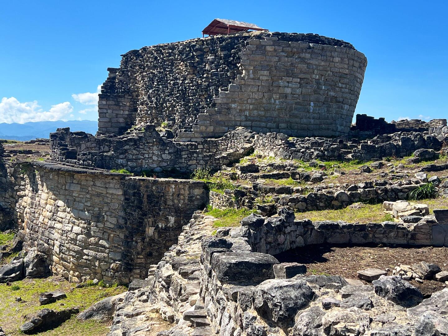 Temple the shape of an inverted cone, containing a top opening internal sacrificial chamber
