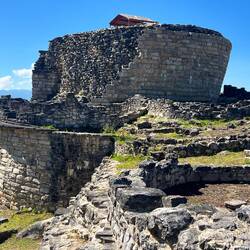 Temple the shape of an inverted cone, containing a top opening internal sacrificial chamber