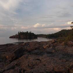 Sun starting to light up the area west of the lighthouse.