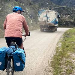 This is a tarmacked road, with potholes and dirt sections. There is often no choice but pothole.