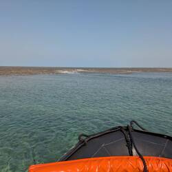 Zodiac approaching the reef
