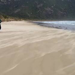 The wind whips up the sand on Norman Beach