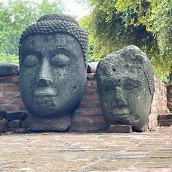 Buddha body parts strewn around