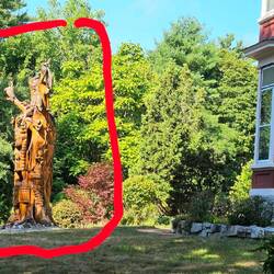 After lightning killed his tree, King had a chainsaw artist have at it