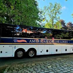 The ACL coaches follow the ship from port to port--unusual