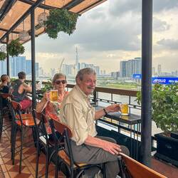 Enjoying cold beers at our hotel’s roof top bar during happy hour.