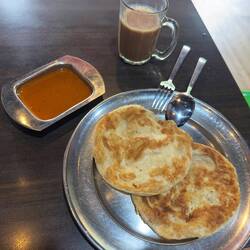 My roti prata and teh tarik snack at Springleaf Prata at Rail Mall.