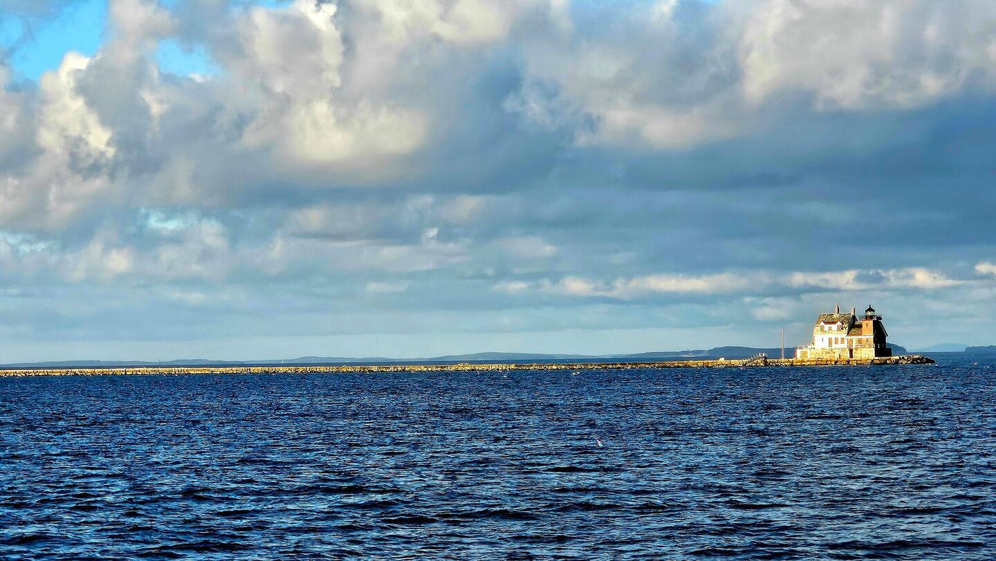 7/8 mile breakwater; equiv to $2 billion in 1880's