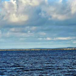 7/8 mile breakwater; equiv to $2 billion in 1880's