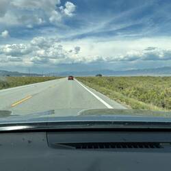 Heading out of Moffat, along the San Luis Valley and 'up' towards Poncha Pass (left of red car)