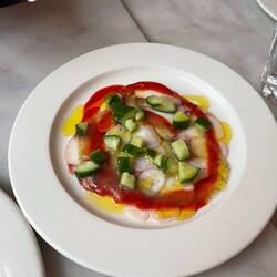 Octopus with stone fruit sauce and cucumbers
