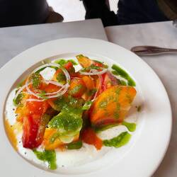 Tomato with salt, yogurt, herb oil. Tastes like sour cream onion chips