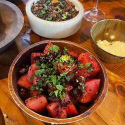 Watermelon with herbs and cheese