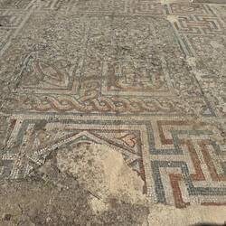 Intricate mosaic work on the sidewalk