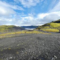 I'm standing in the car park about where the glacier once reached.
