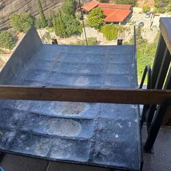 Ancient basket system used to haul goods up the side of the mountain