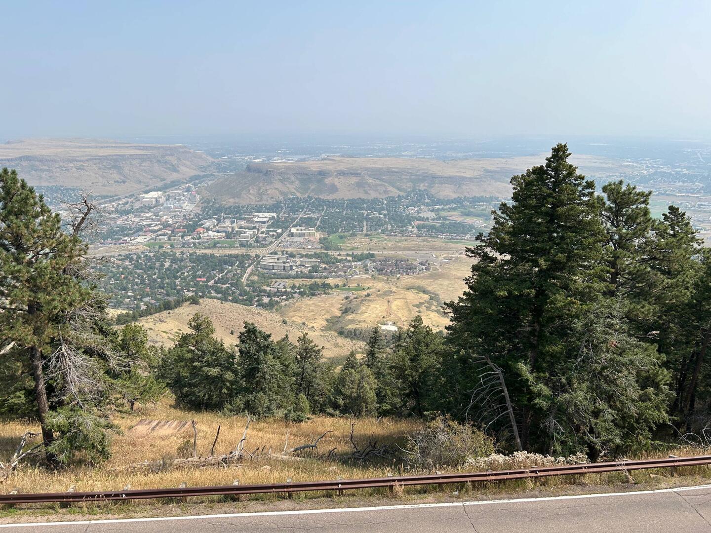 A hazy view east from Lookout Mountain, with Denver obscured