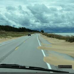 Wind blown sand on Highway 2