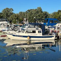 C-Traveler in slip 24 at Pirates Cove. Notice the bikes on the bow.