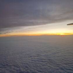 Sunset above the clouds, from the plane