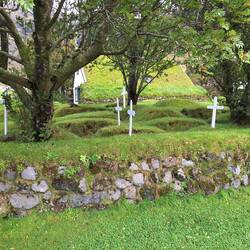 The graves in Iceland cannot be dug deeply because the earth is too hot. You can see the graves on t