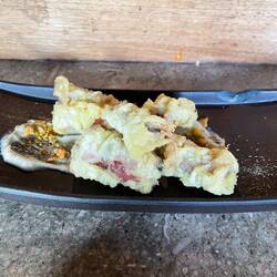 Fig and prosciutto tempura with blue cheese cream