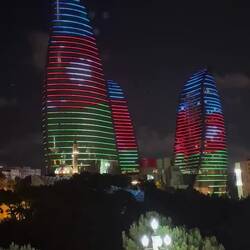 The Flame Towers at night