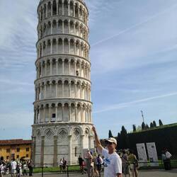 Touching the Leaning Tower of Pisa
